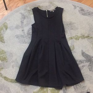 Flirty, pleated & comfortable black dress